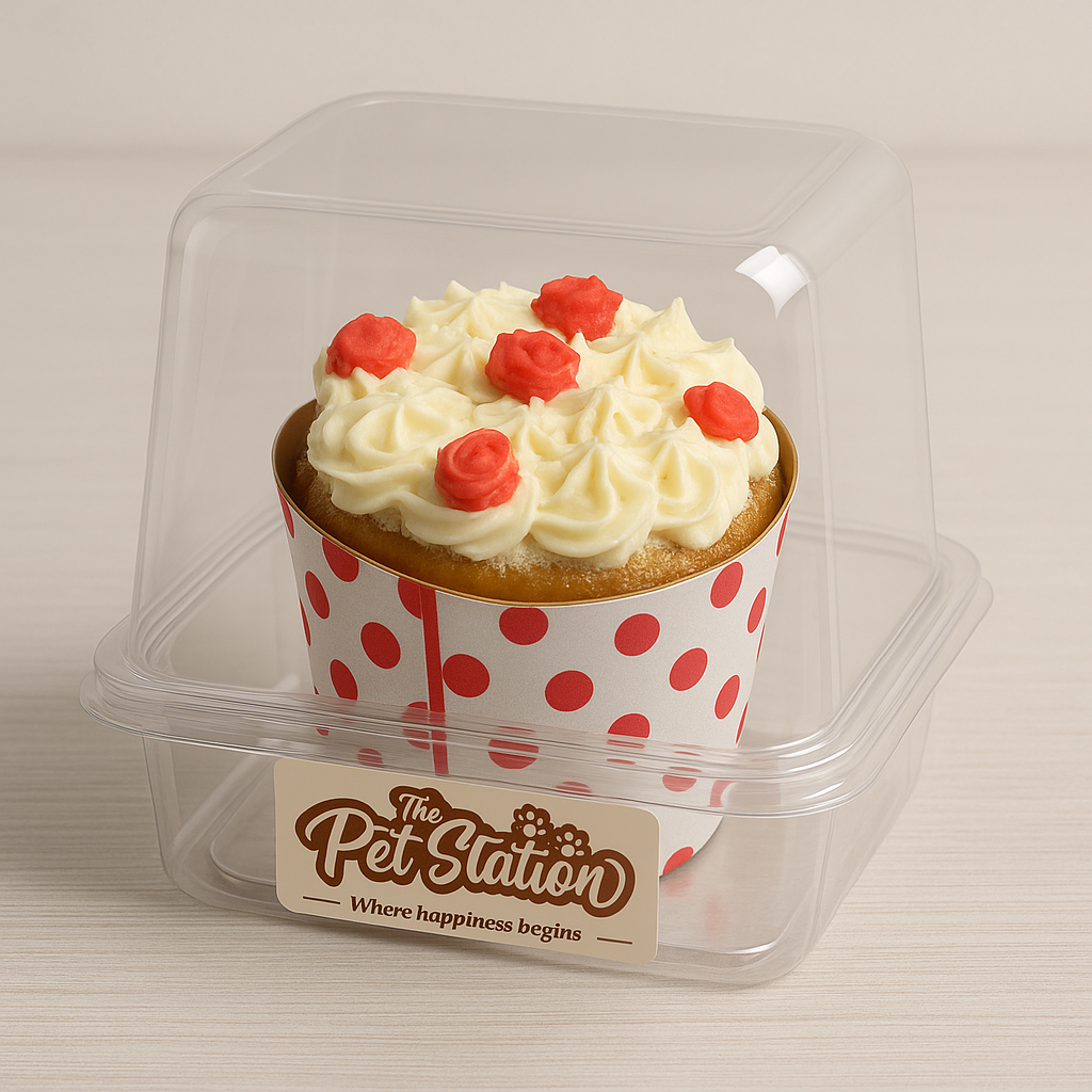 Pupcake from The Pet Station in a clear container, topped with vanilla icing and red rose decorations.